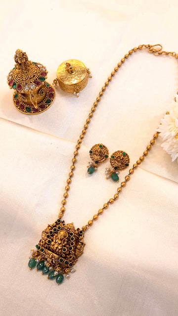 Gold temple jewelry set with Green stones and pearl drops