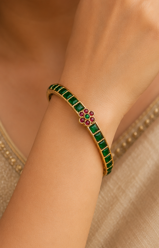 Gold Full Emerald Square Cabochon Channel-Set Bangle with Ruby Kemp Floral Centre | ONK31