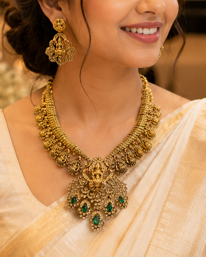 Antique Gold Lakshmi Temple Necklace Set with Emerald Stones | LV630