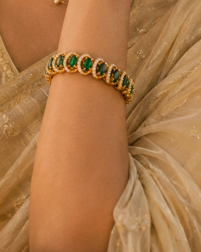 Gold CZ Emerald Marquise Tennis Bracelet with CZ-Paved Arched Links | ONK228