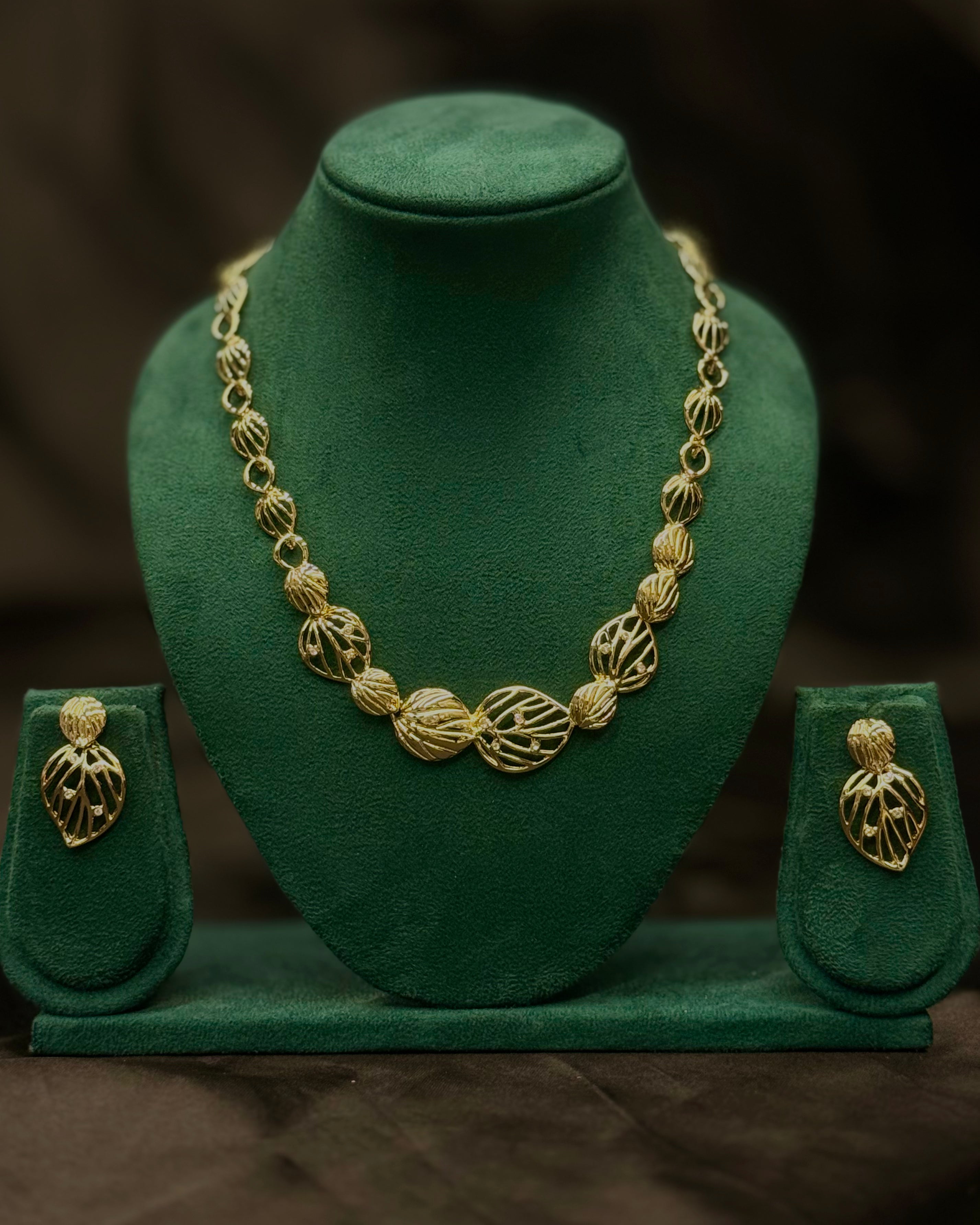 Gold Finish Necklace Set with Earrings - Elegant Leaf Design Jewellery | 2109275