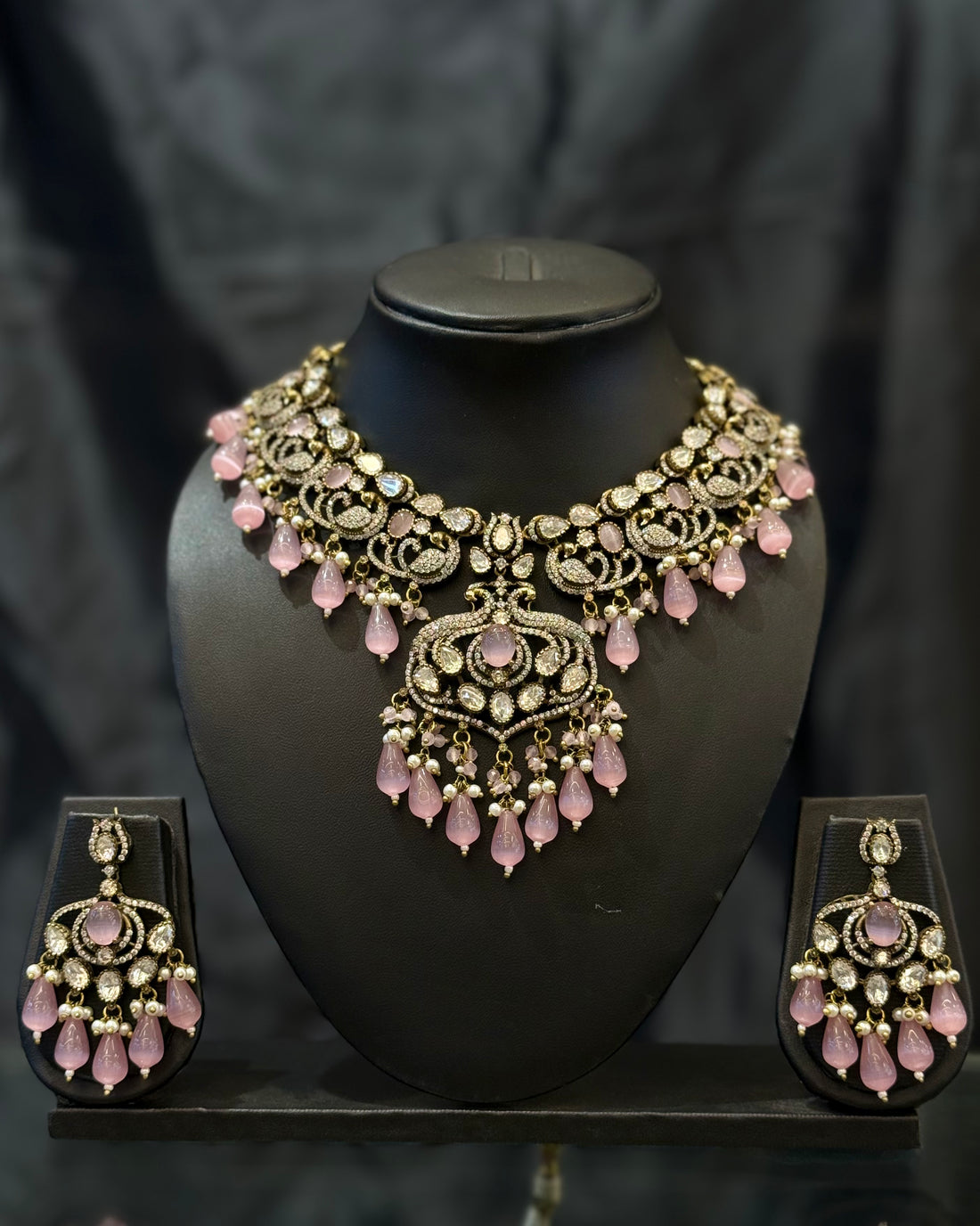 Premium Gold-Tone Pink Stone Statement Necklace Set with Crystal Embellishments and Drop Earrings | L15746
