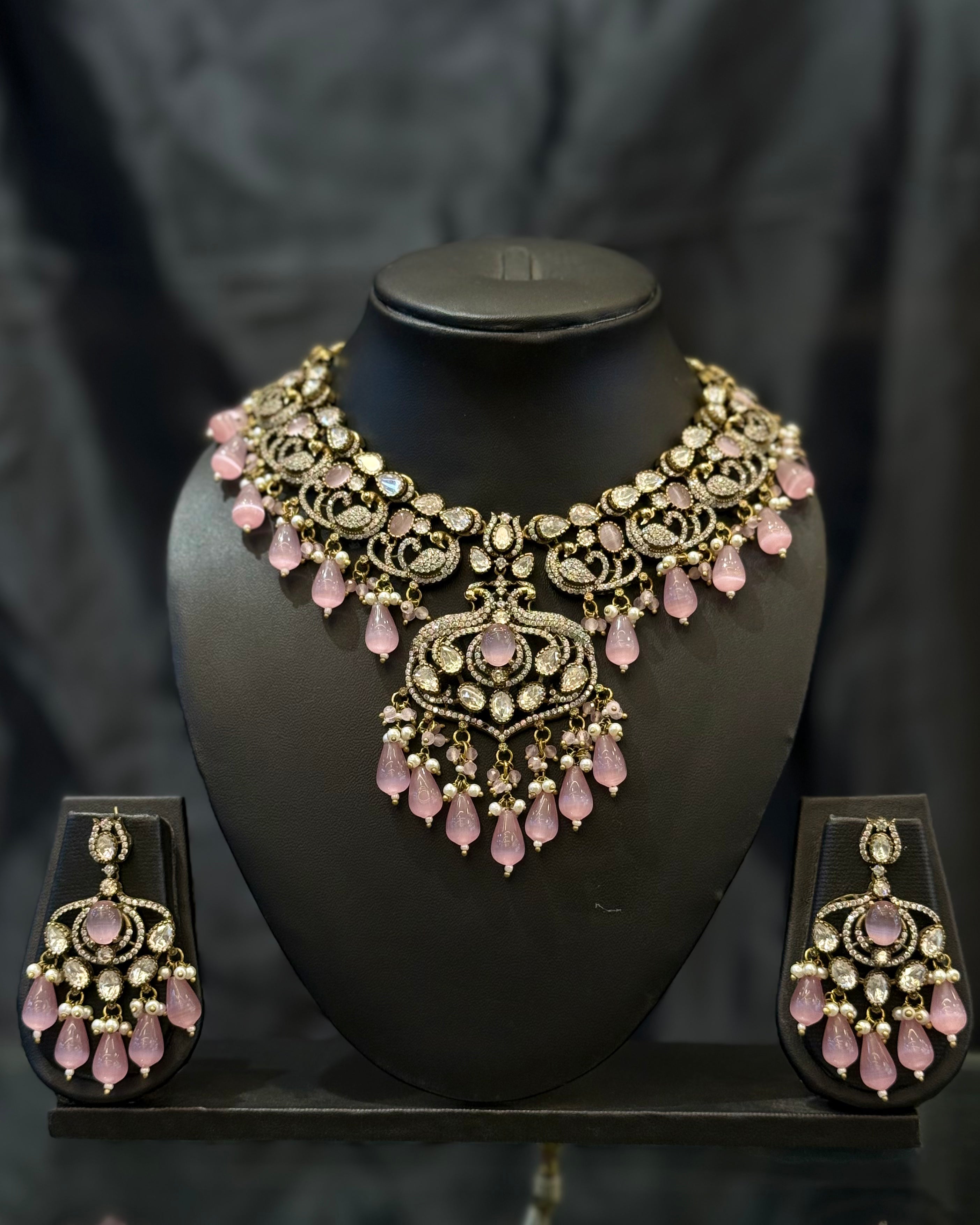 Premium Gold-Tone Pink Stone Statement Necklace Set with Crystal Embellishments and Drop Earrings | L15746