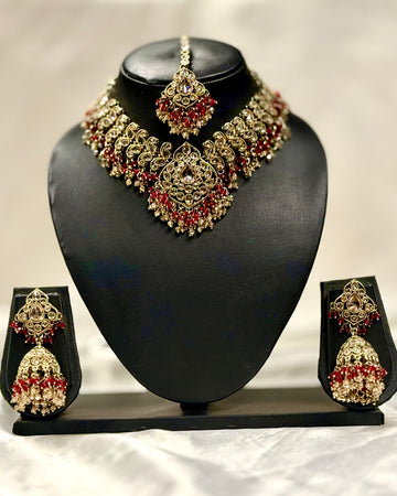 Gold-Plated Bridal Necklace Set with Red Stone Embellishments and Jhumka Earrings | L20042