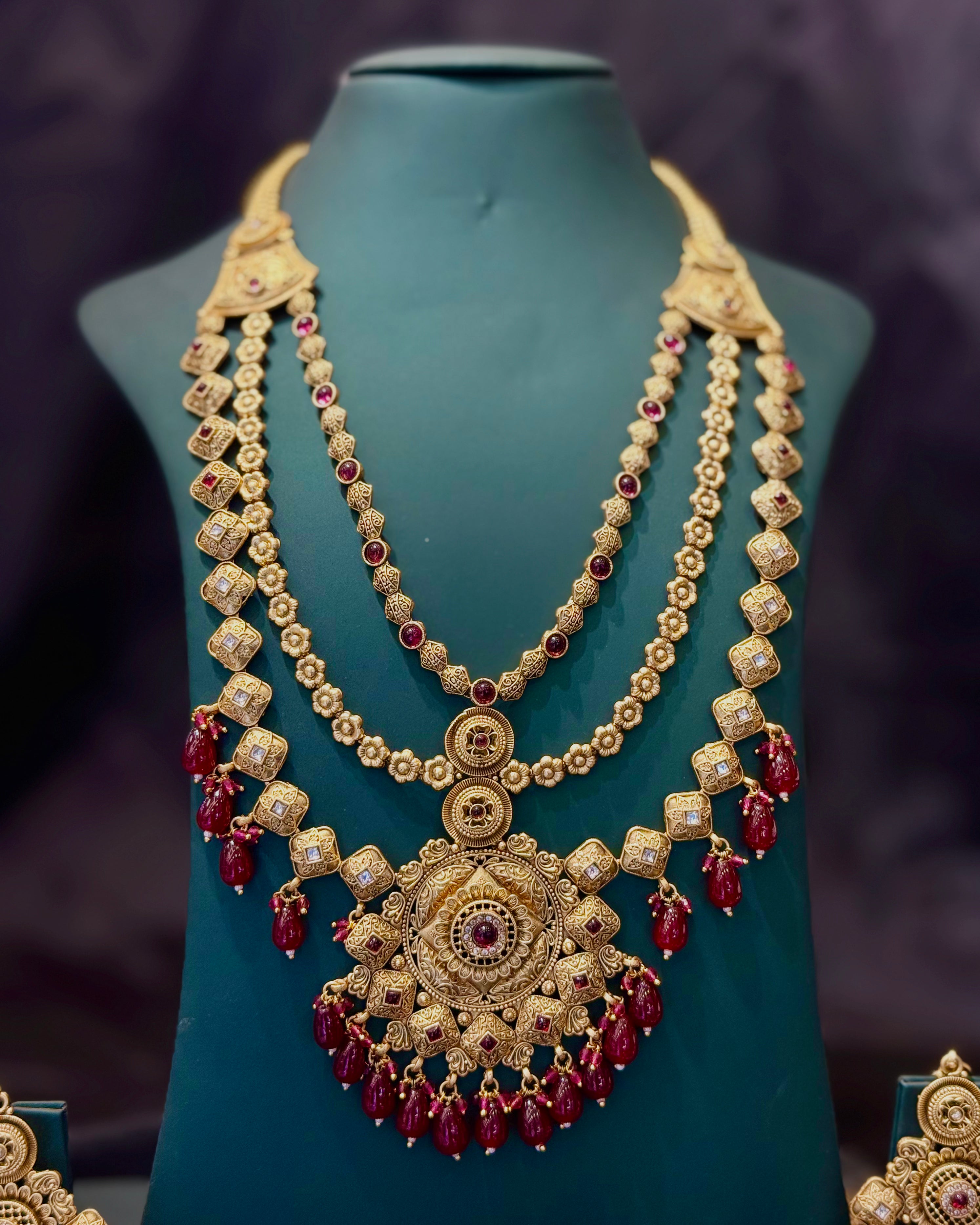 Gold Finish Bridal Necklace Set with Ruby Red Beads and Matching Jhumka Earrings | L8699