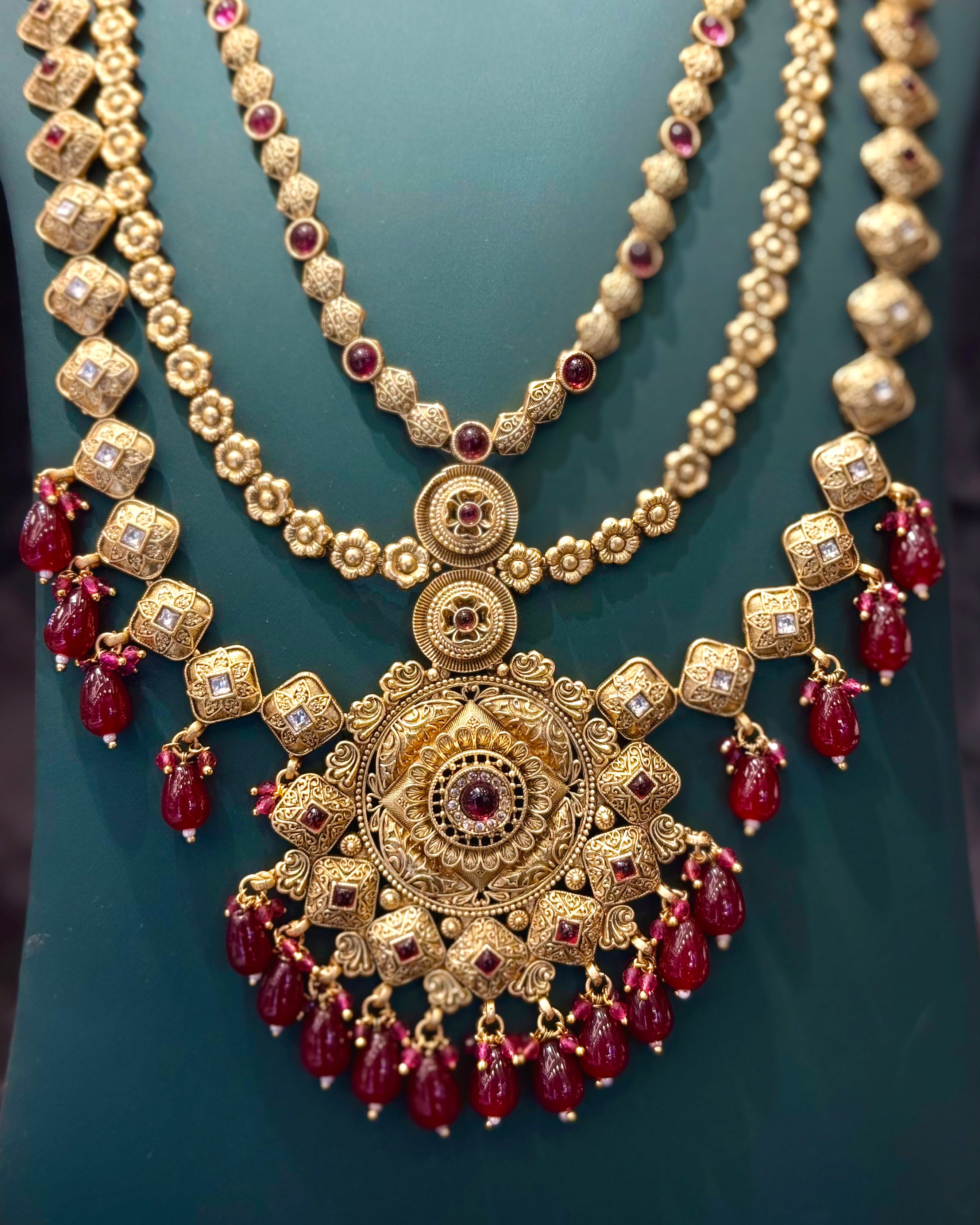 Gold Finish Bridal Necklace Set with Ruby Red Beads and Matching Jhumka Earrings | L8699