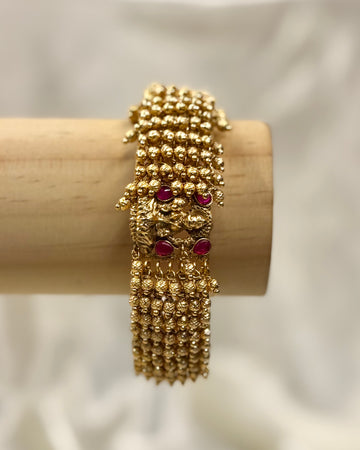 Gold-Toned Textured Bead Bangle with Pink Stone Embellishments - 1 BANGLE | LV971