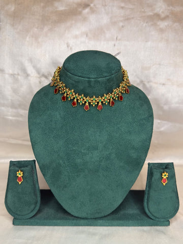 Traditional Gold Necklace Set with Ruby & Green Stones | NKT87