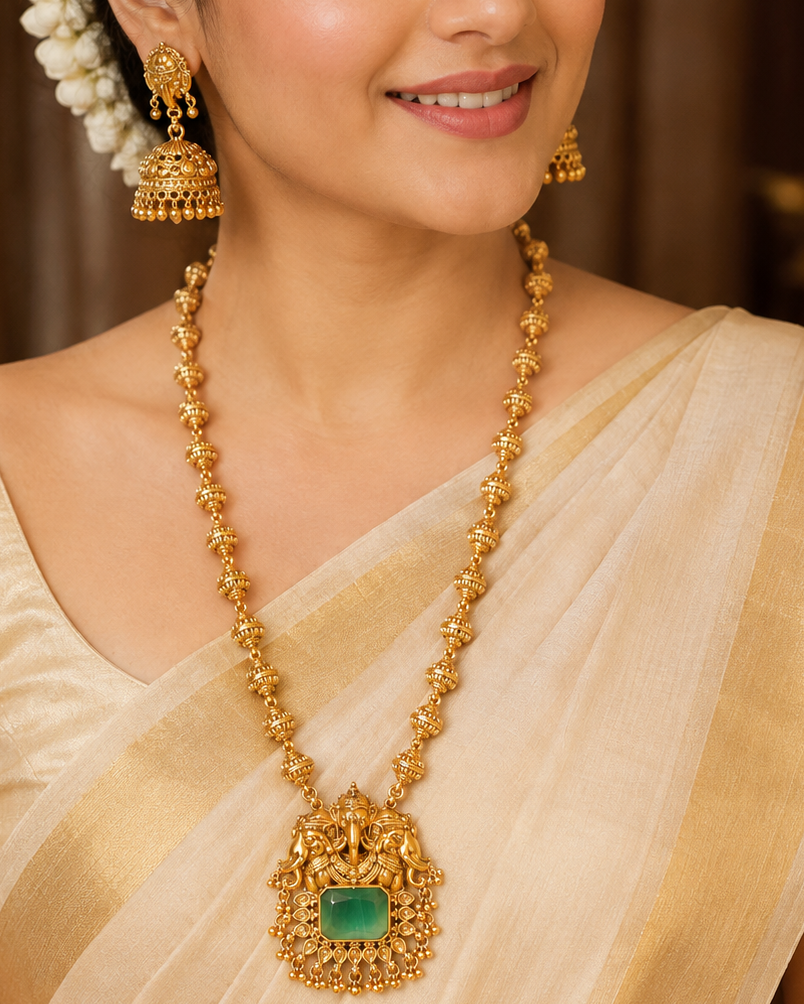 Gold Twin Elephant Nakshi Temple Pendant Emerald Cabochon Graduated Melon Ball Long Haram Set | ONK103