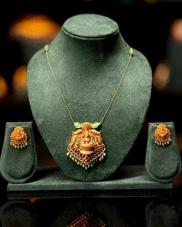 Antique Gold Lakshmi Pendant Necklace Set with Green Beads | ONK351