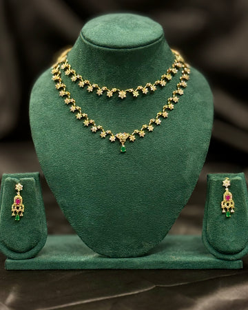 Elegant Gold Floral Necklace Set with Pink Stones | ONK359