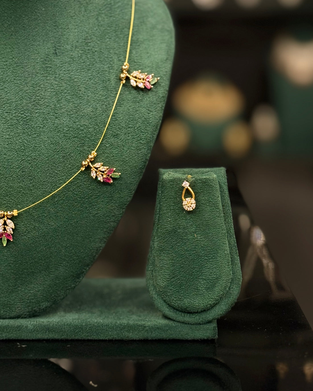 Elegant Gold Leaf Necklace Set with Pink & White Stones | ONK374