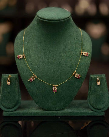 Elegant Gold Leaf Necklace Set with Pink & White Stones | ONK374