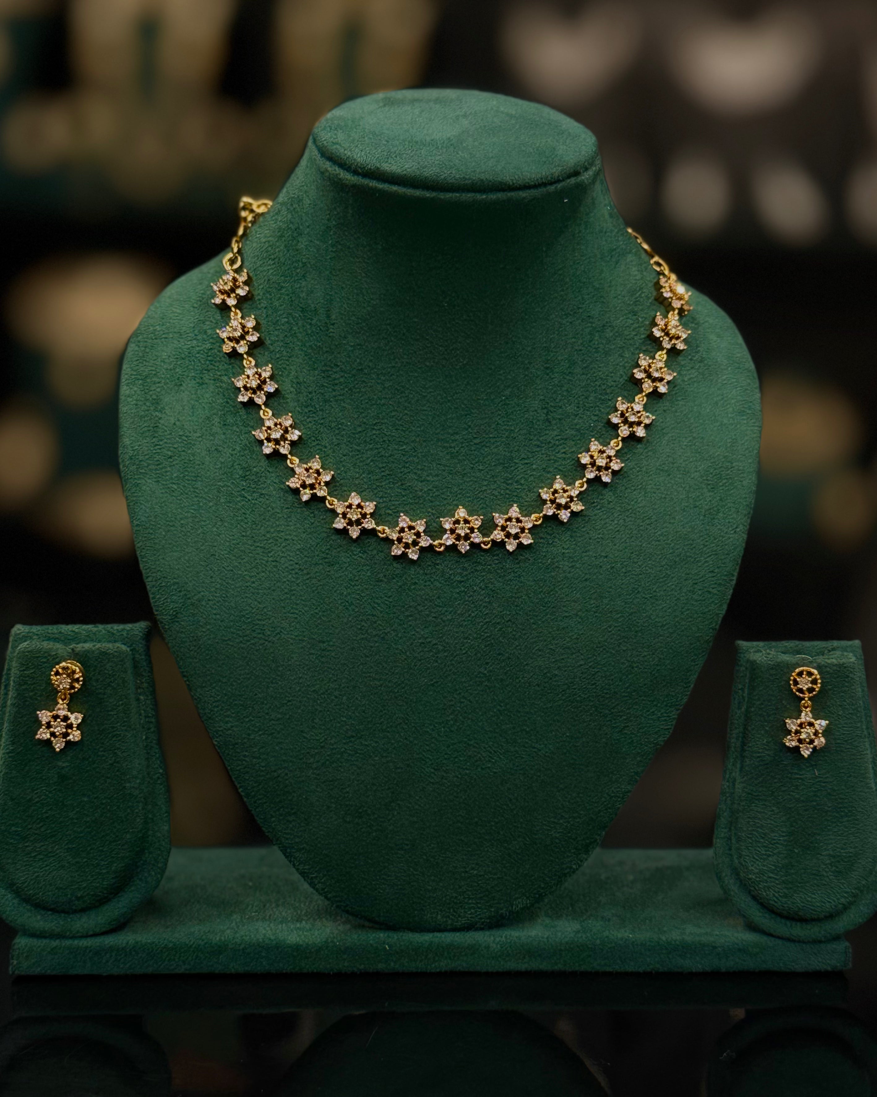 Elegant Gold Floral Necklace Set with Matching Earrings | ONK379