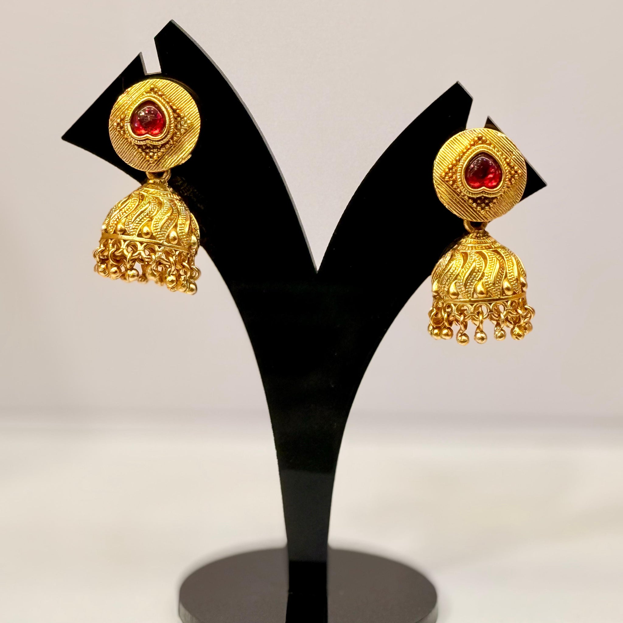 Antique Gold-Plated Jhumkas with Red Stone