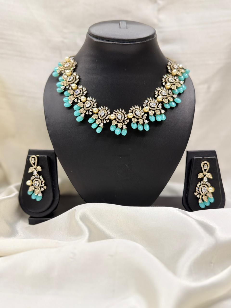 DESIGNER AMERICAN DIAMOND NECKLACE SET WITH AQUA BLUE DROPS LLB -290