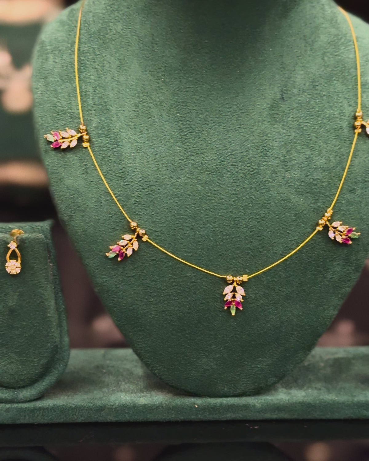 Elegant Gold Leaf Necklace Set with Pink & White Stones | ONK374